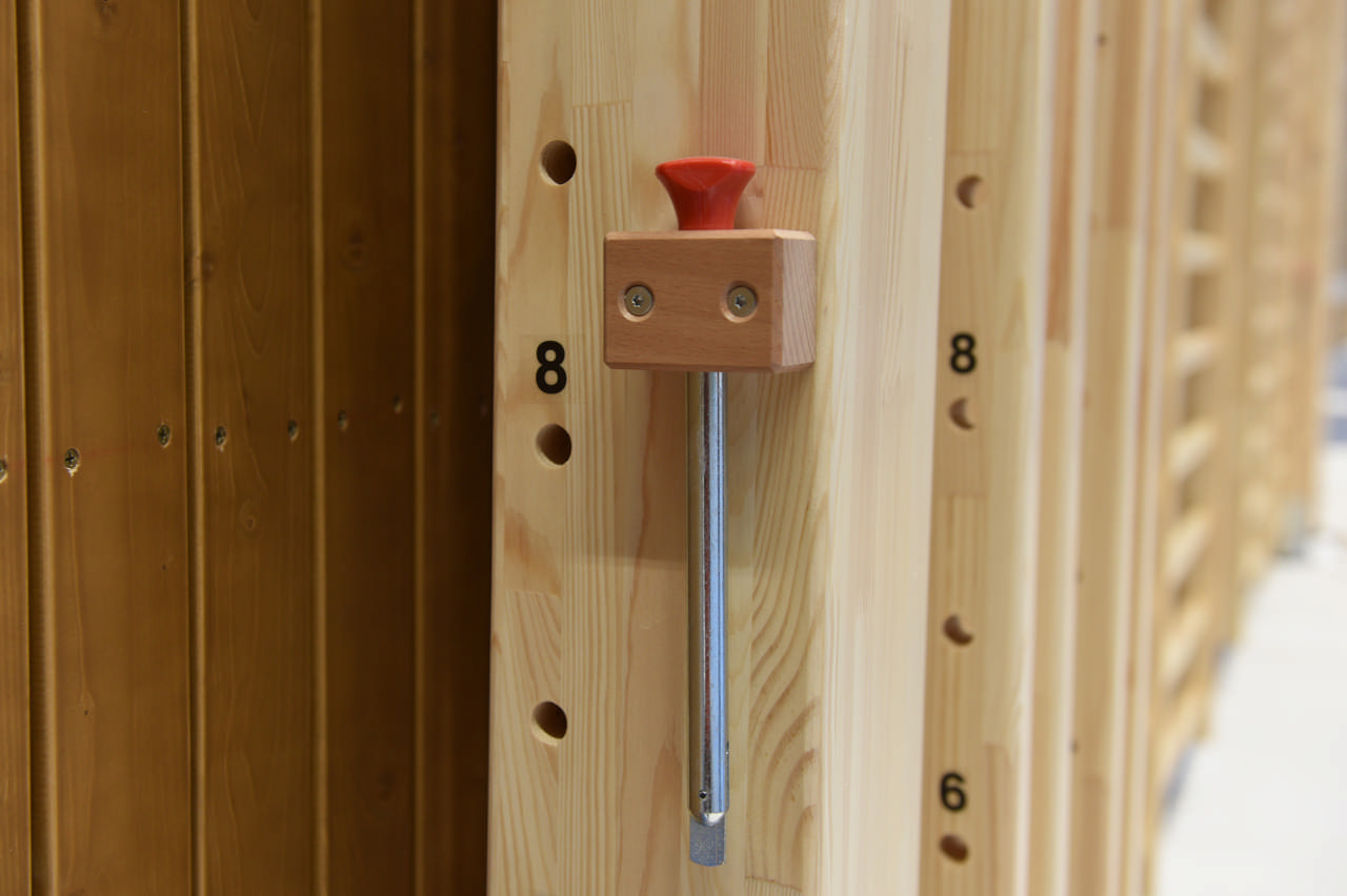 Bombolt lås til bomsystem