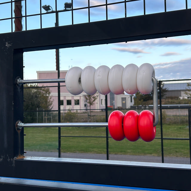 Pointtæller med holder